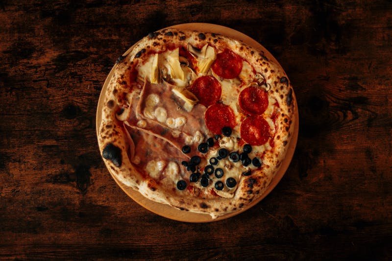 Full pizza buffet spread with multiple varieties