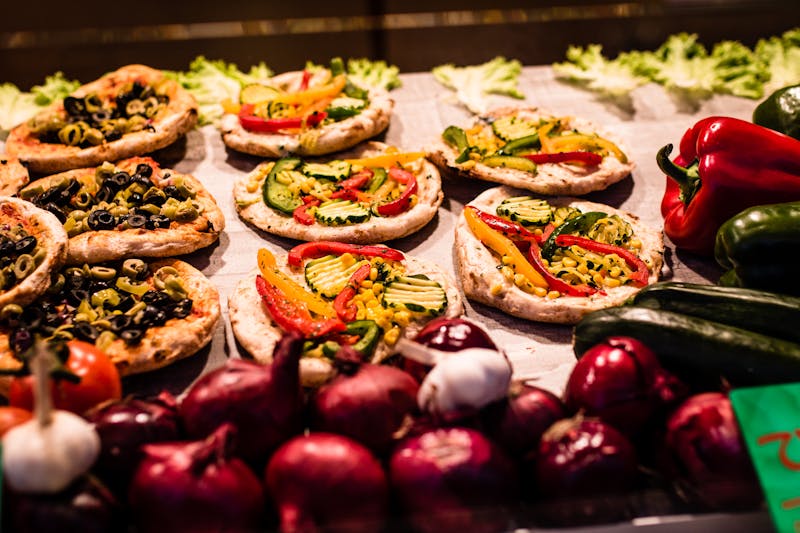 Close-up of colorful fresh pizza toppings